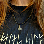 Tiny silver Mjolnir on Cord
