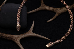 Bear head Neck Torque photographed on Antlers