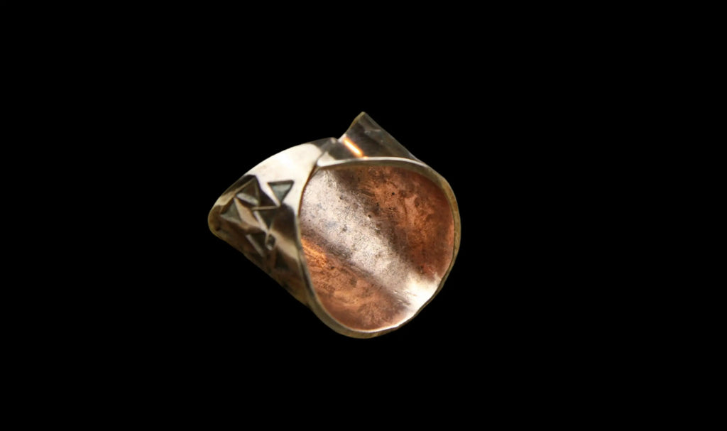 The inner of a beautiful Bronze Hand Stamped Ring made in high copper alloy.