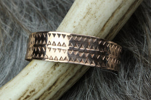 This piece of stamped Viking jewllery is handmade in the Valhallas Silver workshop in Northern Ireland.