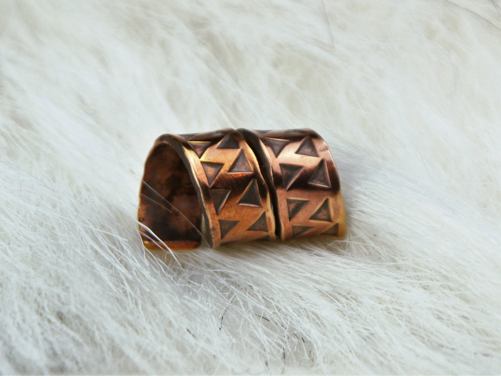 Stamped with a typical Viking Age Triangle Punch.
