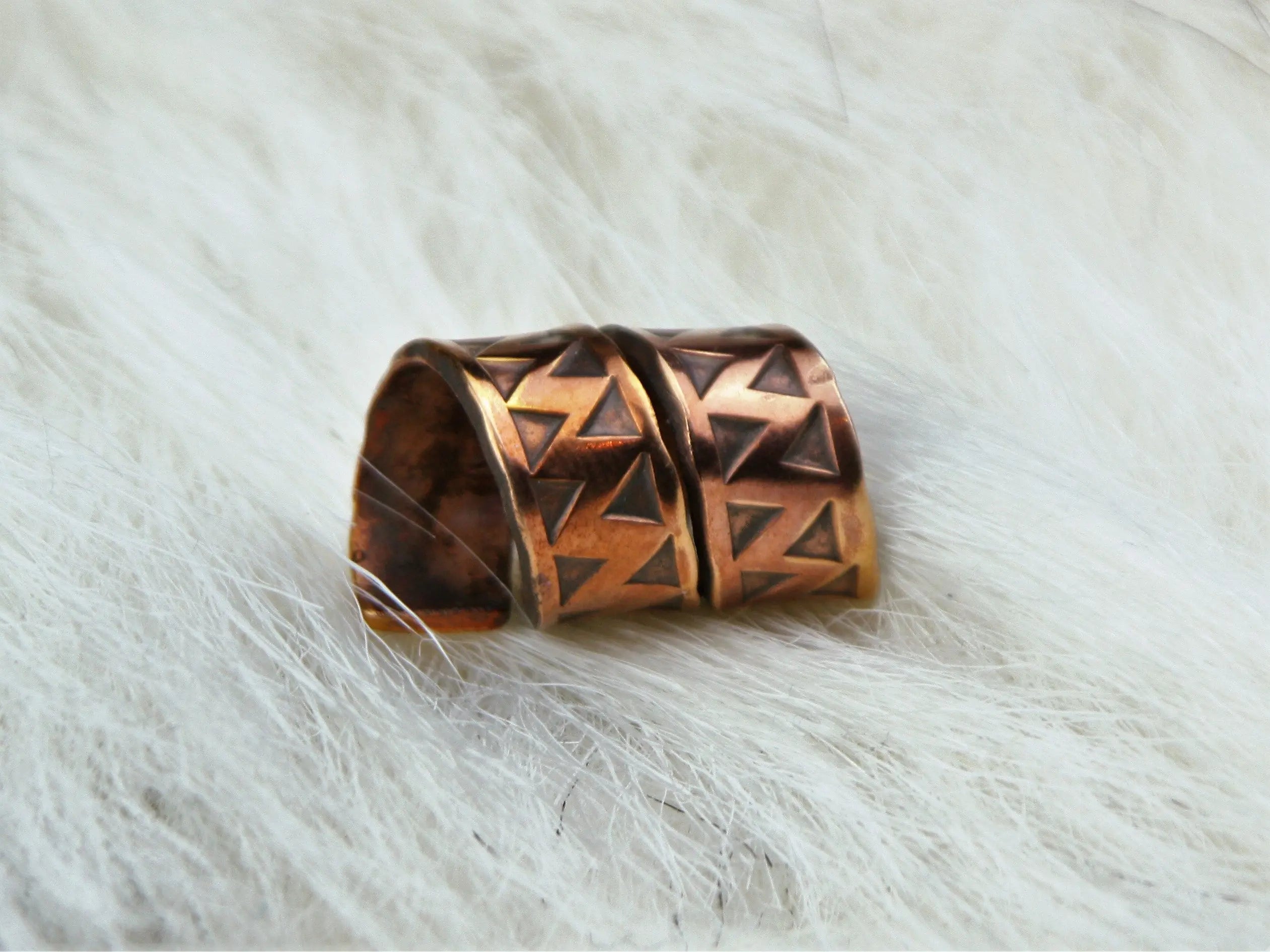 Stamped with a typical Viking Age Triangle Punch.