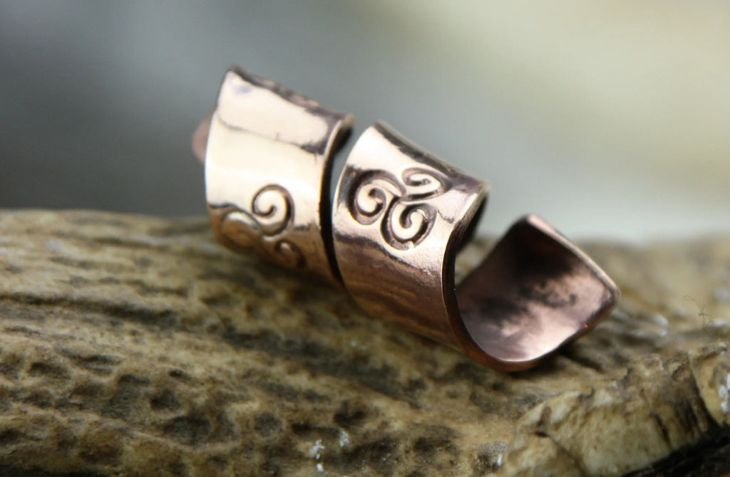 Viking Bronze Stamped with a spiral punch and then twisted into a spiral b