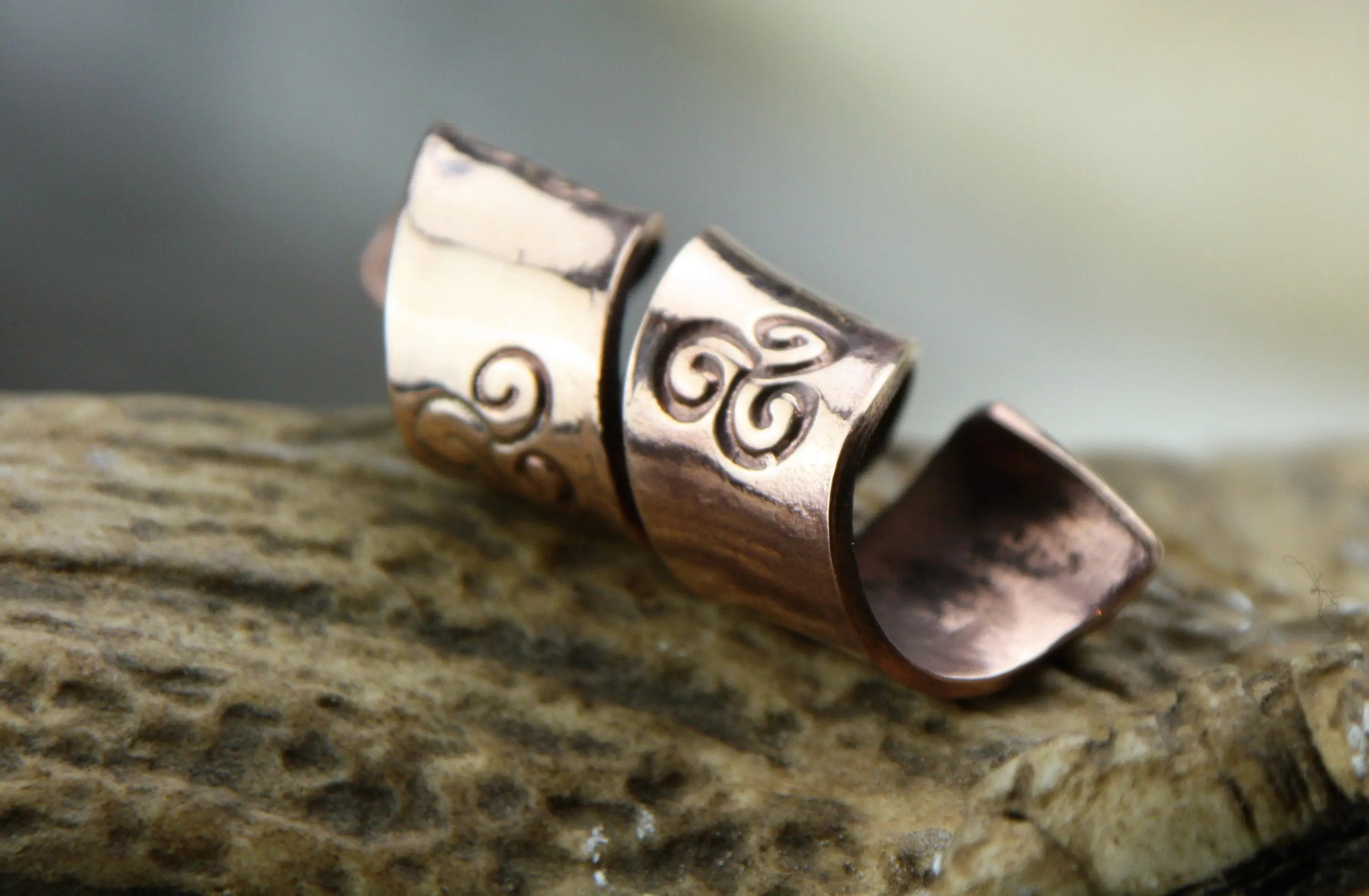 Viking Bronze Stamped with a spiral punch and then twisted into a spiral b