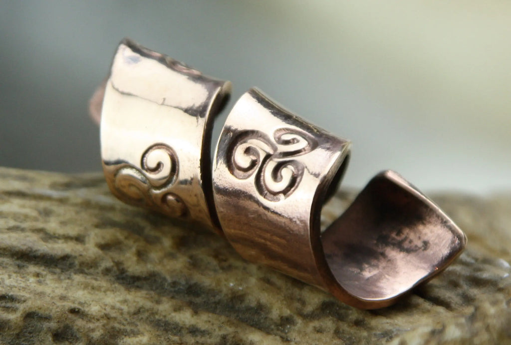 Spiral bead Made from a beautiful rose coloured bronze.